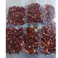 Small cubes of Iberian ham from free-range pigs.